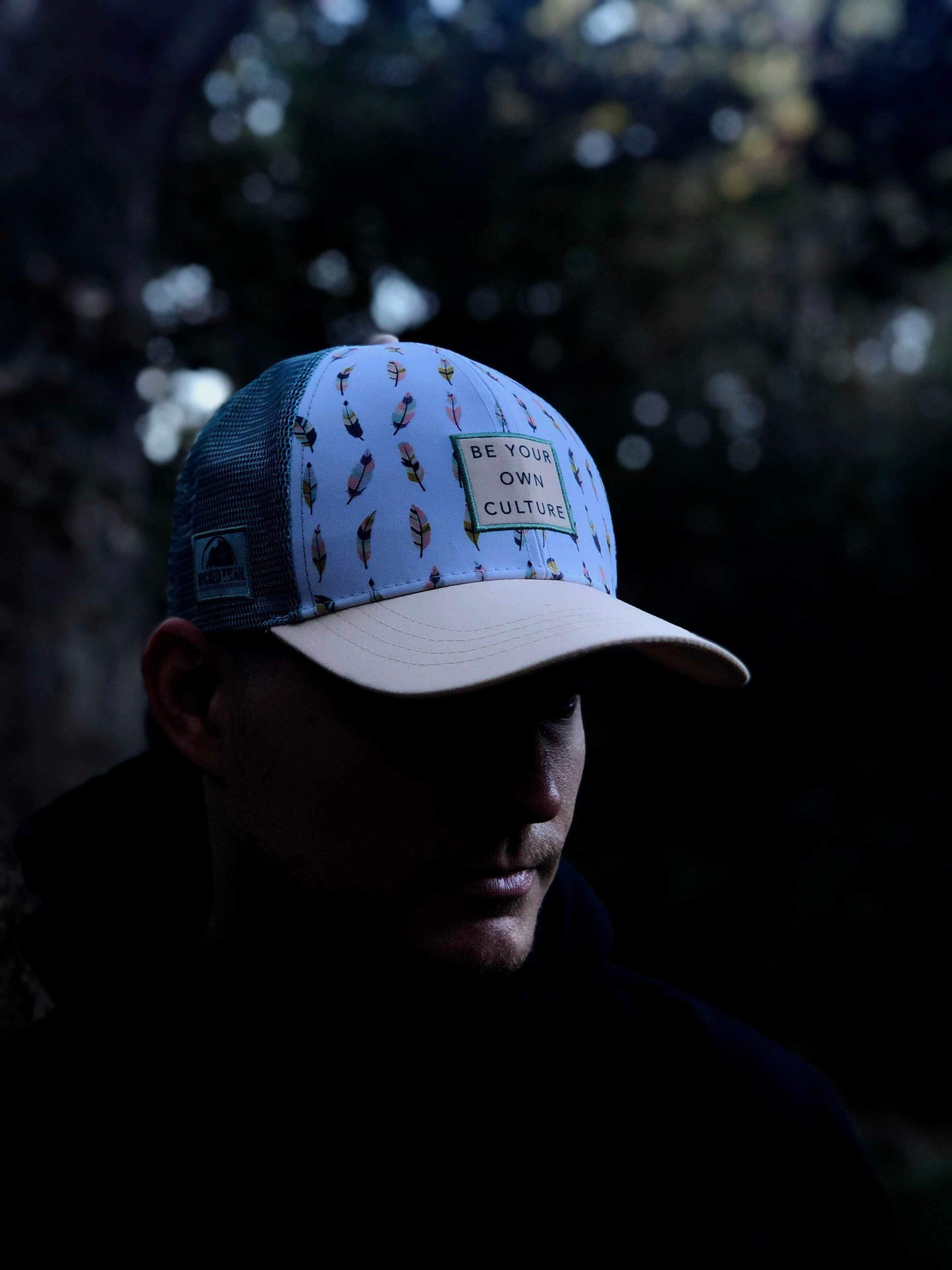 'Be Your Own Culture' Running Trucker Hat - Feathers