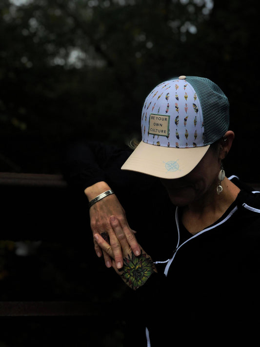 'Be Your Own Culture' Running Trucker Hat - Feathers