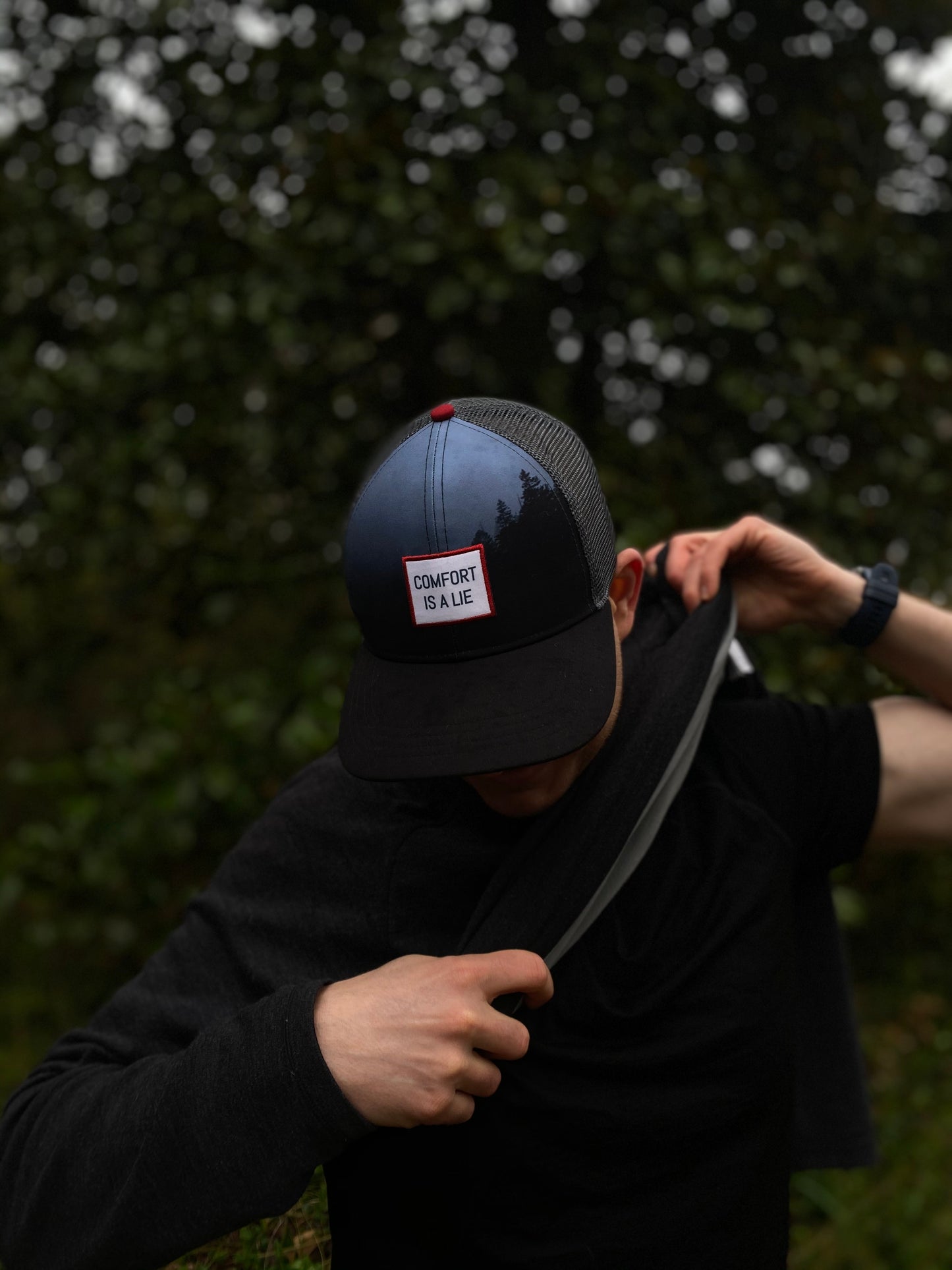 'Comfort Is A Lie' Running Trucker Hat - Night