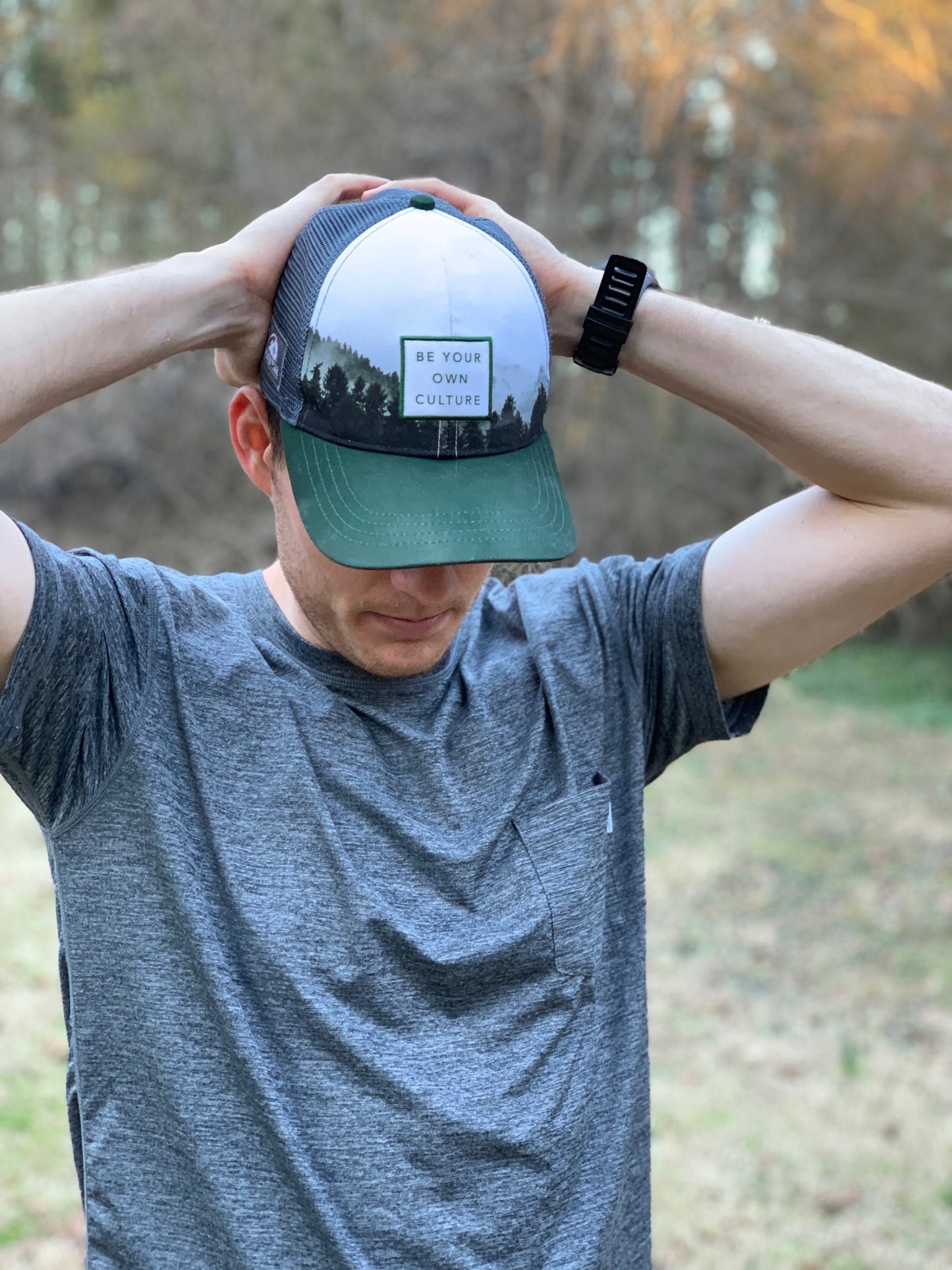 'Be Your Own Culture' Running Trucker Hat