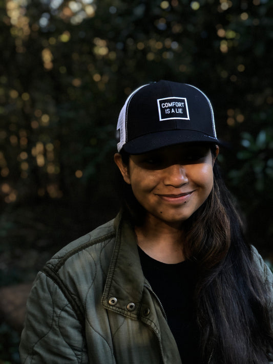 'Comfort Is A Lie' Running Trucker Hat - Black/White