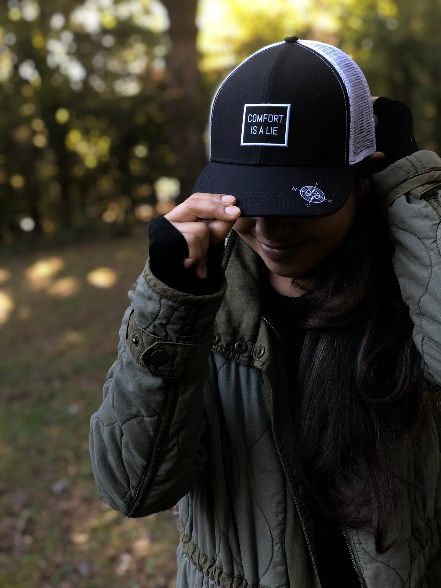 'Comfort Is A Lie' Running Trucker Hat - Black/White