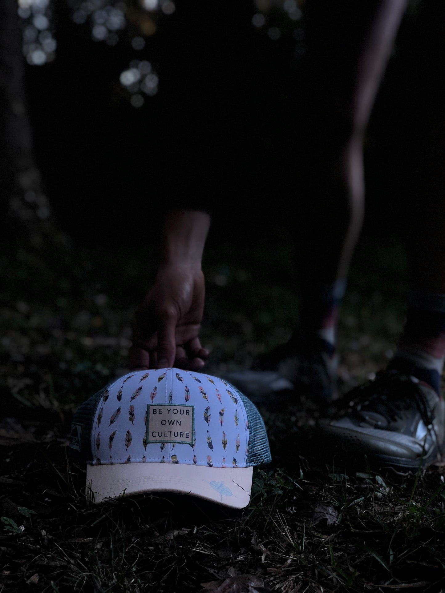 'Be Your Own Culture' Running Trucker Hat - Feathers
